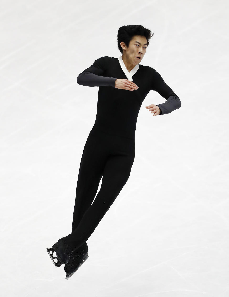 FILE - In this March 24, 2018, file photo, United States' Nathan Chen performs during men's free skate at the Figure Skating World Championships in Assago, near Milan, Italy. Chen, master of the quad, is on the verge of skating off with his fourth consecutive title at the U.S. Championships this week. (AP Photo/Antonio Calanni, File)