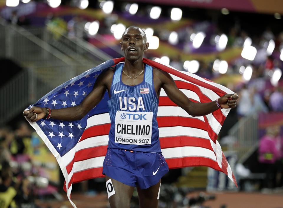 United States' Paul Kipkemoi Chelimo celebrates after winning the bronze medal in the men's 5000-meter final during the World Athletics Championships in London Saturday, Aug. 12, 2017. (AP Photo/Matthias Schrader)