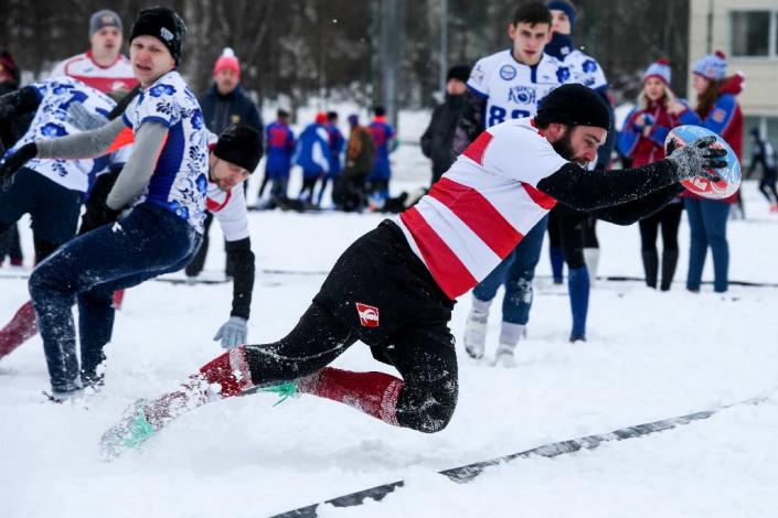 In the Moscow suburb of Zelenograd, 28 male and 12 female teams compete in what the organisers believe is the biggest snow rugby tournament in the world (AFP Photo/Kirill KUDRYAVTSEV)