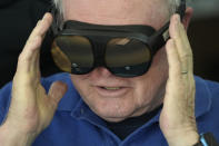 Pete Audet, a 76-year-old retired information technology worker, wears a Mynd Immersive virtual reality headset at John Knox Village, Wednesday, Jan. 31, 2024, in Pompano Beach, Fla. John Knox Village was one of 17 senior communities around the country that participated in a recently published Stanford University study that found that large majorities of 245 participants between 65- and 103-years-old enjoyed virtual reality, improving both their emotions and their interactions with staff. (AP Photo/Lynne Sladky)