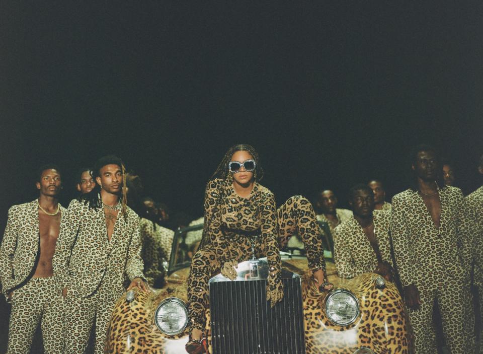 Beyoncé in leopard-print Valentino Haute Couture, with dancers, in "Black Is King"