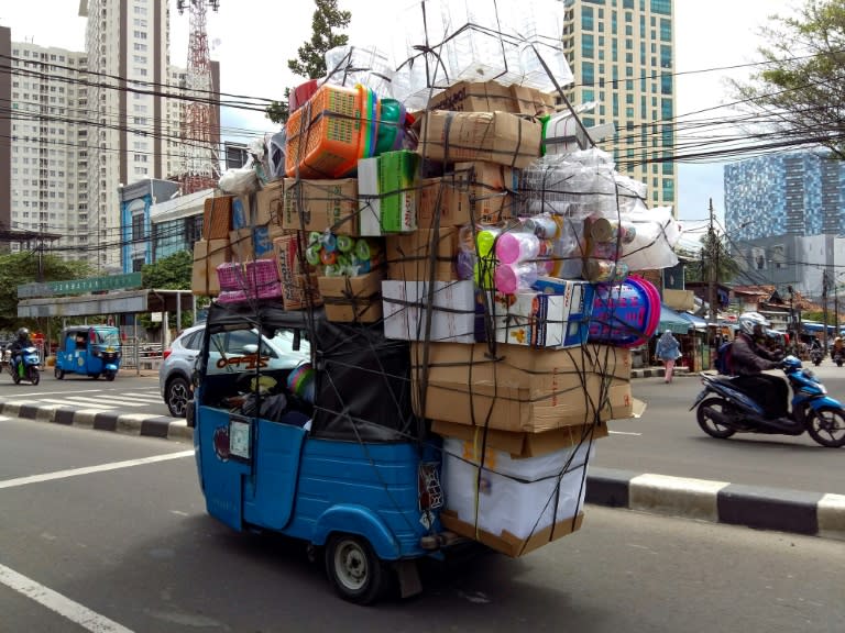 For some, sitting in a tuk-tuk as it teeters and rumbles over Jakarta's roads offers a connection to an older way of life