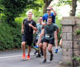 <p>Superman always saves the day! Cavill broke a sweat while serving as ambassador for the Durrell Challenge 2017, a run to raise money for the Durrell Wildlife Conservation Trust in his native Jersey, England. (Photo: Mirrorpix/Splash News) </p>