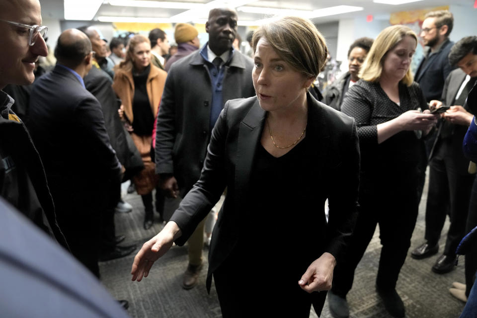 Massachusetts Gov. Maura Healey greets people after taking questions from reporters Wednesday, Jan. 31, 2024, following a tour of the Cass Recreational Complex, in the Roxbury neighborhood of Boston. The visit to the facility was held ahead of its planned opening as a temporary shelter site for families experiencing homelessness as the state continues to grapple with an influx of homeless migrants. (AP Photo/Steven Senne)