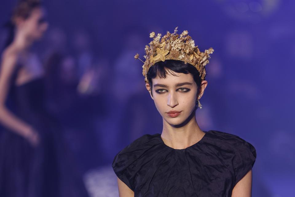 A model wears a creation as part of the Christian Dior Fall/Winter 2023-2024 ready-to-wear collection presented Tuesday, Feb. 28, 2023 in Paris. (Vianney Le Caer/Invision/AP)