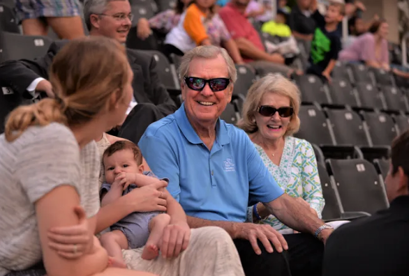 Charlie and Judy Bradshaw, joined by granddaughter Julia and her nephew Jackson McGreevy, 3 months, at the Charlie's Challenge golf baseball tournament at Wofford College in August 2016.