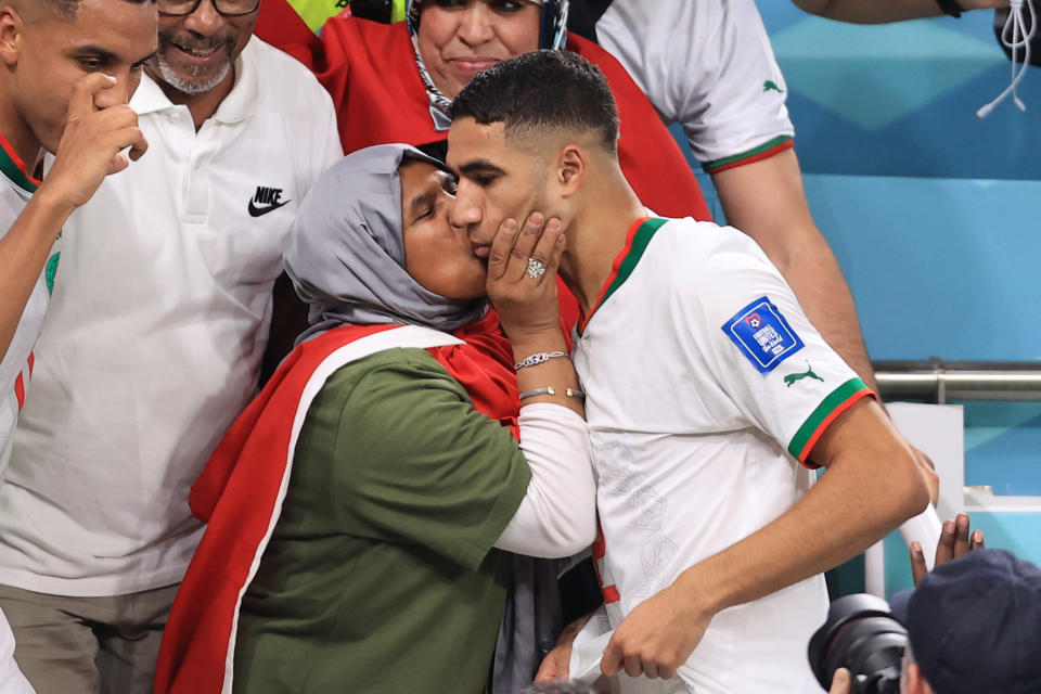 DOHA, QATAR - NOVEMBER 27: Achraf Hakimi of Morocco gets a kiss from his mother after the FIFA World Cup Qatar 2022 Group F match between Belgium and Morocco at Al Thumama Stadium on November 27, 2022 in Doha, Qatar. (Photo by Simon Stacpoole/Offside/Offside via Getty Images)