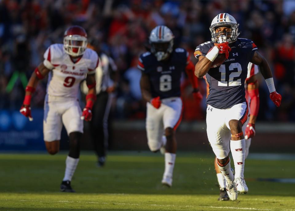 Auburn WR Eli Stove scored the Tigers' first TD of the night on a 78-yard run. (AP)