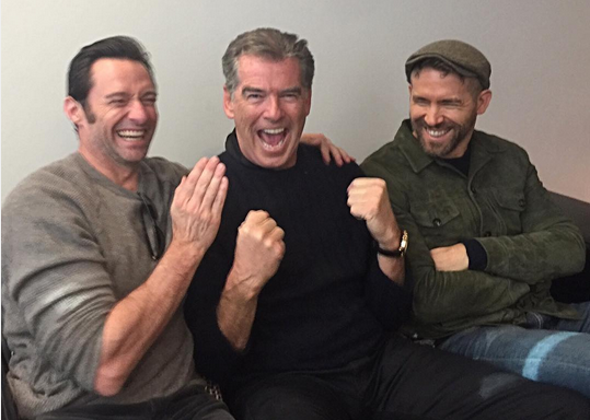 Just a bunch of manly men sitting around having fun as Jackman, left, Pierce Brosnan, center, and Ryan Reynolds yucked it up, noting that it was a 