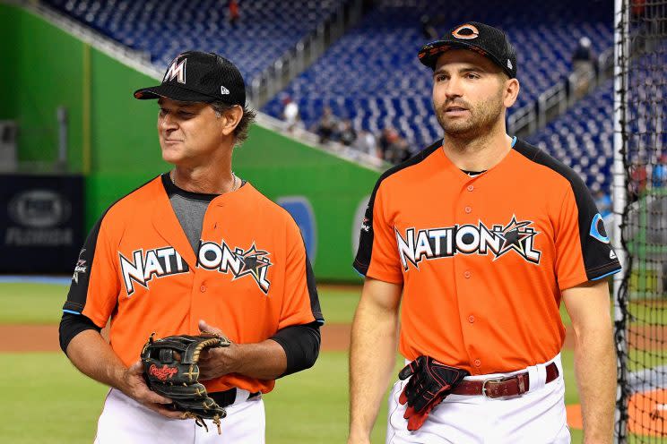 Joey Votto (right) made sure Zack Cozart got the ball from his first All-Star hit. (Getty Images)