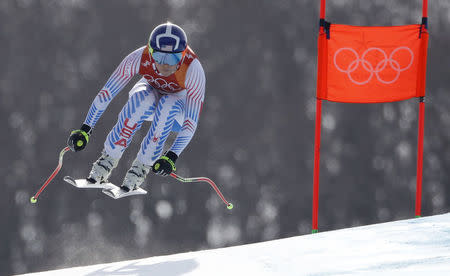 Lindsey Vonn of the U.S. competes in women's downhill alpine skiing. REUTERS/Christian Hartmann