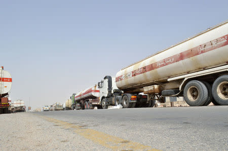 Fuel tanker trucks carrying smuggled petrol are seen on a road linking Bir Ali with Ataq city, the provincial capital of Shabwa province, Yemen, January 10, 2016. REUTERS/Stringer