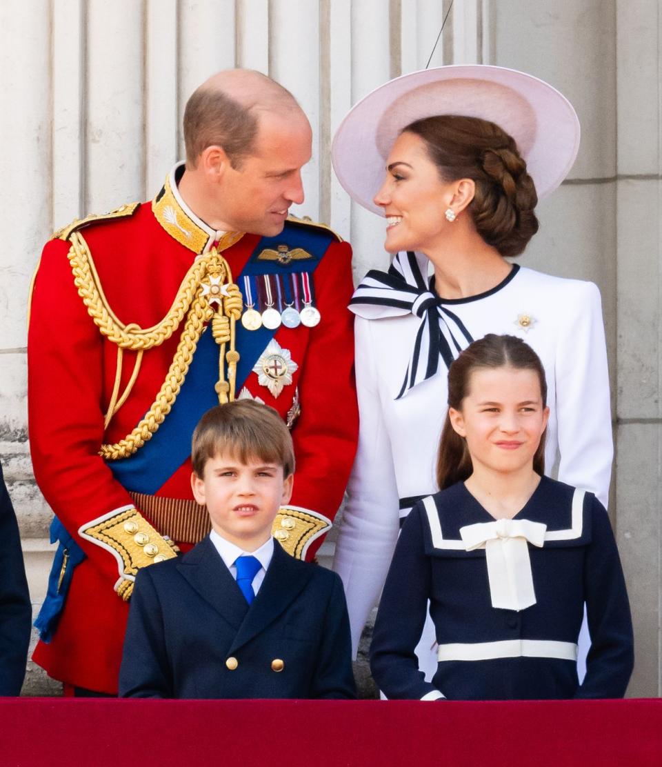 london, england june 15 prince william, prince of wales, prince louis of wales, princess charlotte of wales and catherine, princess of wales during trooping the colour on june 15, 2024 in london, england trooping the colour is a ceremonial parade celebrating the official birthday of the british monarch the event features over 1,400 soldiers and officers, accompanied by 200 horses more than 400 musicians from ten different bands and corps of drums march and perform in perfect harmony photo by samir husseinwireimage