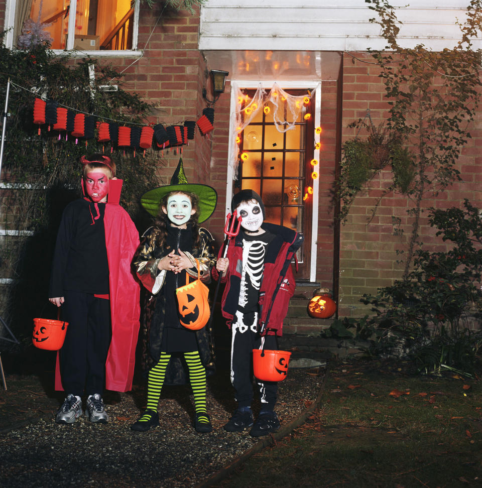 Stock picture of children dressed up for Halloween and going trick or treating. (Getty Images)