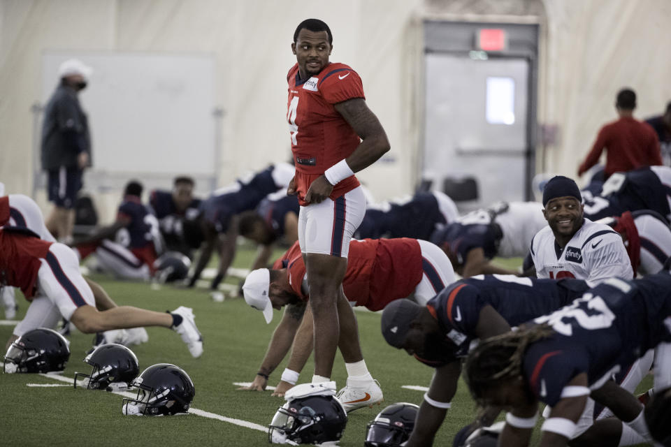 Houston Texans quarterback Deshaun Watson (4) warms up during an NFL training camp football practice Friday, Aug. 14, 2020, at The Houston Methodist Training Center in Houston. (Brett Coomer/Houston Chronicle via AP)