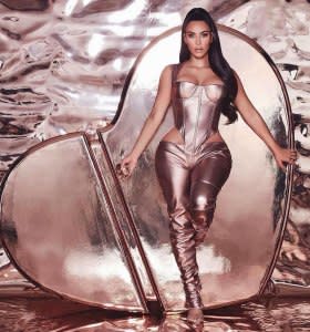 Kim Kardashian Shows a Little Skin in a Butt-Baring Jumpsuit for the KKW Fragrance Promo