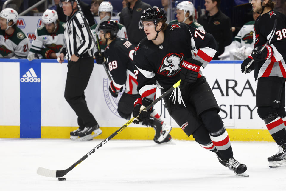 Buffalo Sabres center Tage Thompson (72) carries the puck up ice during the second period of the team's NHL hockey game against the Minnesota Wild, Saturday, Jan. 7, 2023, in Buffalo, N.Y. (AP Photo/Jeffrey T. Barnes)