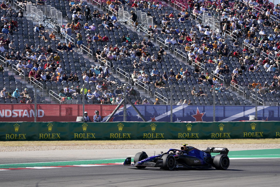 Williams test driver Logan Sargeant drives during a practice session for the Formula One U.S. Grand Prix auto race at Circuit of the Americas, Friday, Oct. 21, 2022, in Austin, Texas. (AP Photo/Charlie Neibergall)