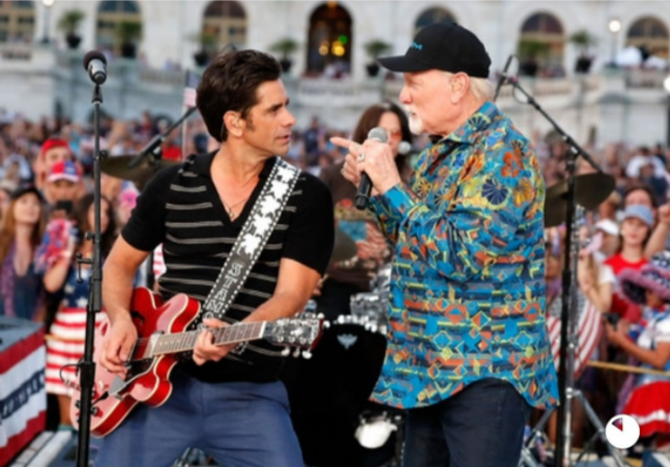 Actor and musician John Stamos, left, of "Full House" fame, performs with Mike Love of The Beach Boys. Stamos will join the band for its July 11 concert at Capital Credit Union Park in Ashwaubenon.