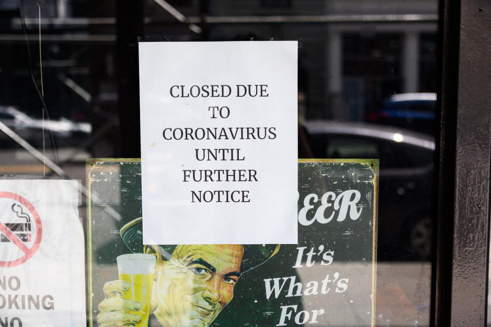 NEW YORK, NEW YORK - JULY 22:  A sign is posted in a bar that reads, "Closed due to Coronavirus until further notice" as the city enters Phase 4 of re-opening following restrictions imposed to slow the spread of coronavirus on July 22, 2020 in New York City. The fourth phase allows outdoor arts and entertainment, sporting events without fans and media production. (Photo by Noam Galai/Getty Images)