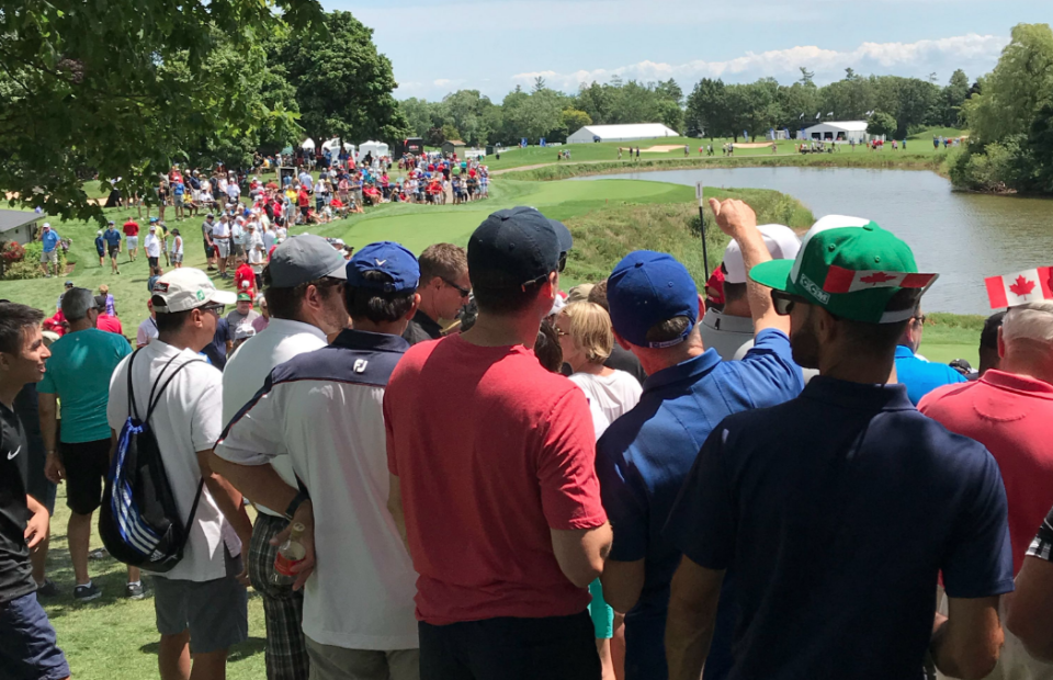 Fans gathered around the first tee at Glen Abbey golf course in Oakville, Ontario.