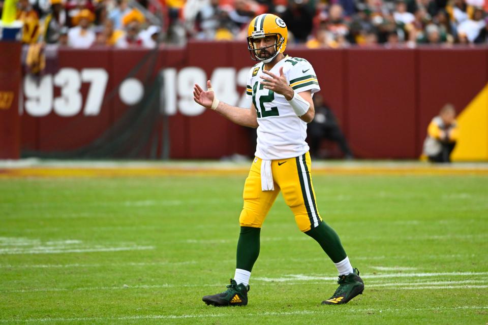 Packers quarterback Aaron Rodgers reacts against the Washington Commanders during the second half at FedExField.