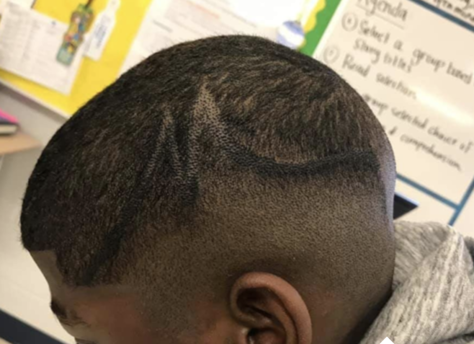 A school administrator made a junior high student cover up the "M" design in his hair with a marker. (Facebook)