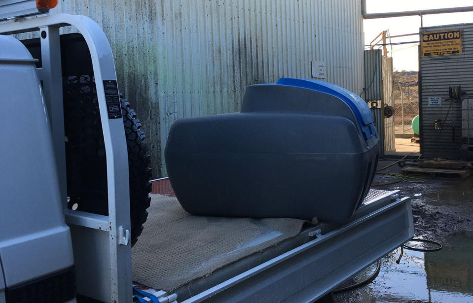 The fuel tank was drained, revealing a steel box allegedly containing $947,000 cash, sealed in cryovac bags. Source: NSW Police Force