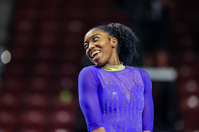 UCLA's Chae Campbell smiles at teammates during the Pac-12 Championships. (Photo by Bryan Byerly/Pac-12 Conference)