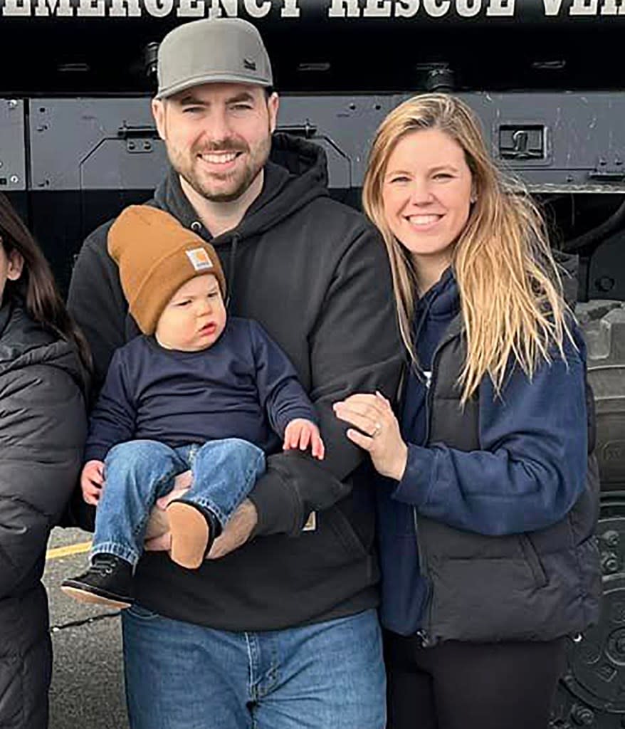 Officer Diller, 31, poses with his wife, Stephanie, and their baby son Ryan. facebook/jonnymac