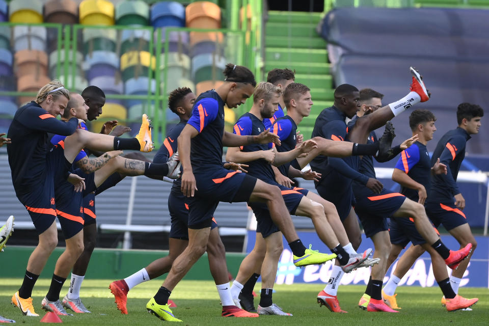 Leipzig players exercise during a training session at the Jose Alvalade stadium in Lisbon, Wednesday Aug. 12, 2020. Leipzig will play Atletico Madrid in a Champions League quarterfinals soccer match on Thursday. (Lluis Gene/Pool via AP)
