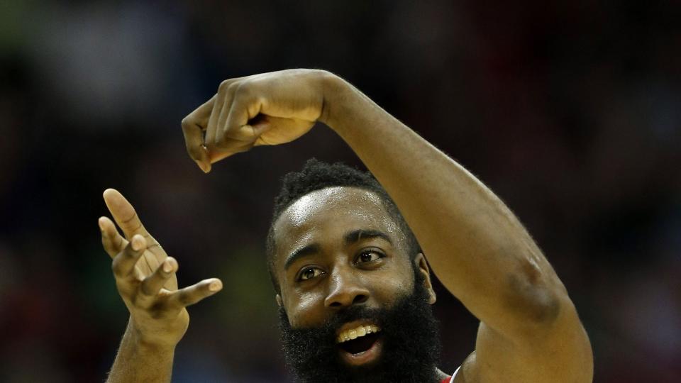 nba player james harden doing his signature celebration gesture