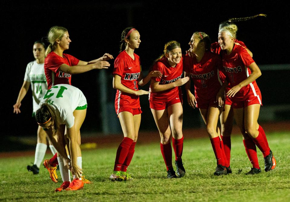 Members of the North Fort Myers High School girls soccer team celebrate a goal against Fort Myers High School at North Fort Myers High School on Wednesday, Jan. 11, 2022. North won.  