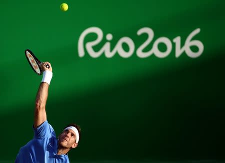 2016 Rio Olympics - Tennis - Quarterfinal - Men's Singles Quarterfinals - Olympic Tennis Centre - Rio de Janeiro, Brazil - 12/08/2016. Juan Martin Del Potro (ARG) of Argentina in action against Roberto Bautista (ESP) of Spain. REUTERS/Toby Melville