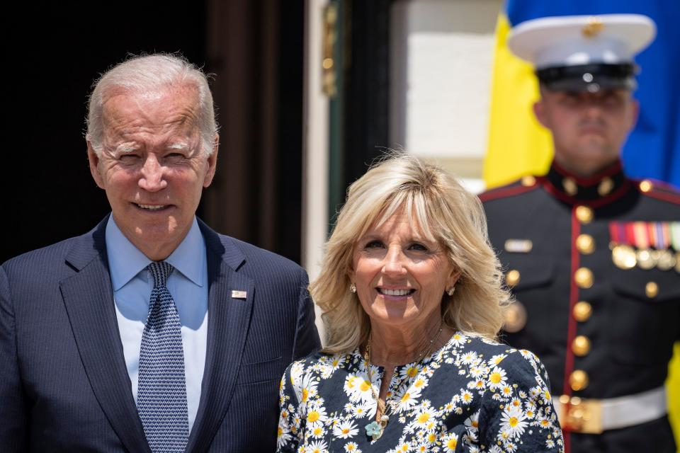 President Joe Biden and first lady Jill Biden pose at the White House as the first lady of Ukraine, Olena Zelenska, arrives on the South Lawn, on July 19, 2022.