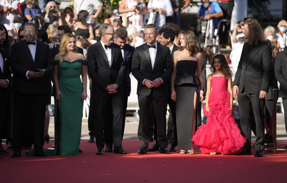 Moussa Maaskri, from left, Abigail Breslin, director Tom McCarthy, Thomas Bidegain, Matt Damon, Noe Debre, Camille Cottin, Lilou Siauvaud, and Idir Azougli pose for photographers upon arrival at the premiere of the film 'Stillwater' at the 74th international film festival, Cannes, southern France, Thursday, July 8, 2021. (AP Photo/Vadim Ghirda)