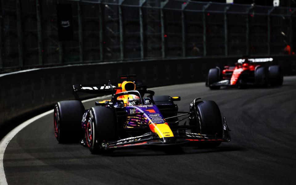 Max Verstappen of the Netherlands driving the (1) Oracle Red Bull Racing RB19 leads Charles Leclerc of Monaco driving the (16) Ferrari SF-23 during the F1 Grand Prix of Las Vegas at Las Vegas Strip Circuit on November 18, 2023 in Las Vegas, Nevada