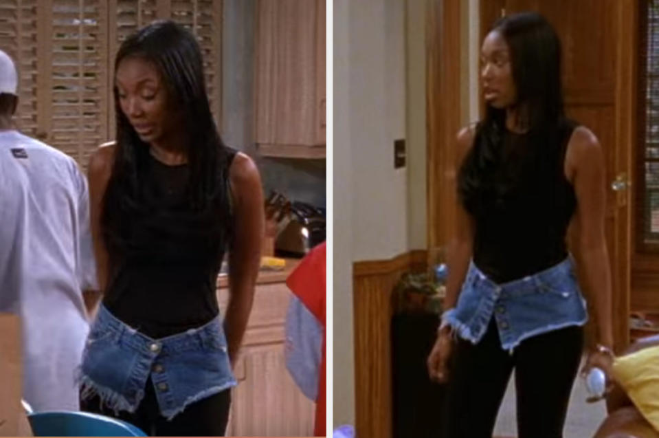 Moesha wearing bodysuit with a denim mini skirt with just one button buttoned