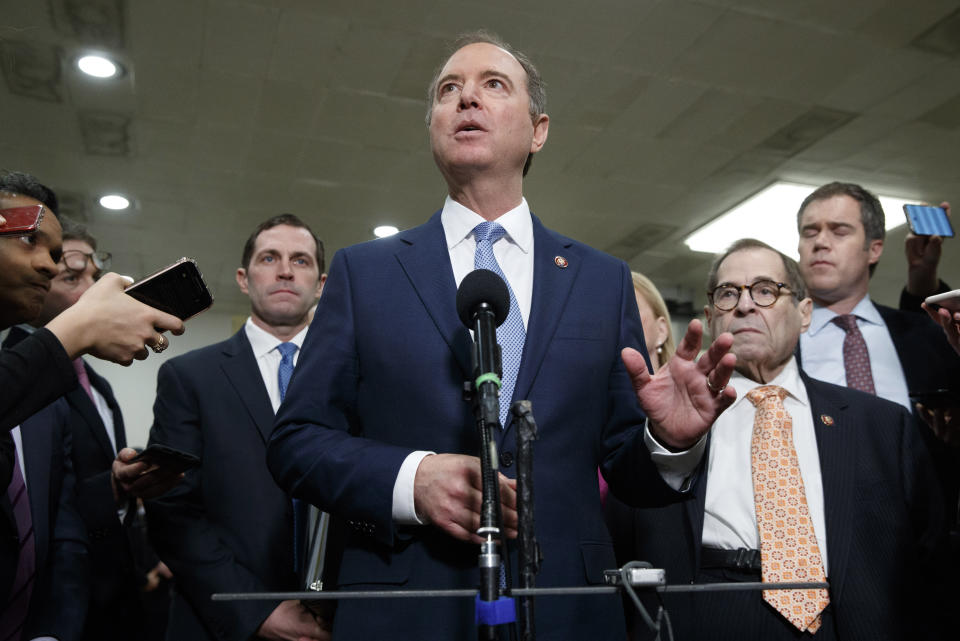 House Democratic impeachment managers including House Intelligence Committee Chairman Adam Schiff, D-Calif., center, with Rep. Jason Crow, D-Colo., left, and Judiciary Committee Chairman Jerrold Nadler, D-N.Y., speaks to the media before attending the fourth day of the impeachment trial of President Donald Trump on charges of abuse of power and obstruction of Congress, Friday, Jan. 24, 2020, on Capitol Hill in Washington. (Photo: Jacquelyn Martin/AP)