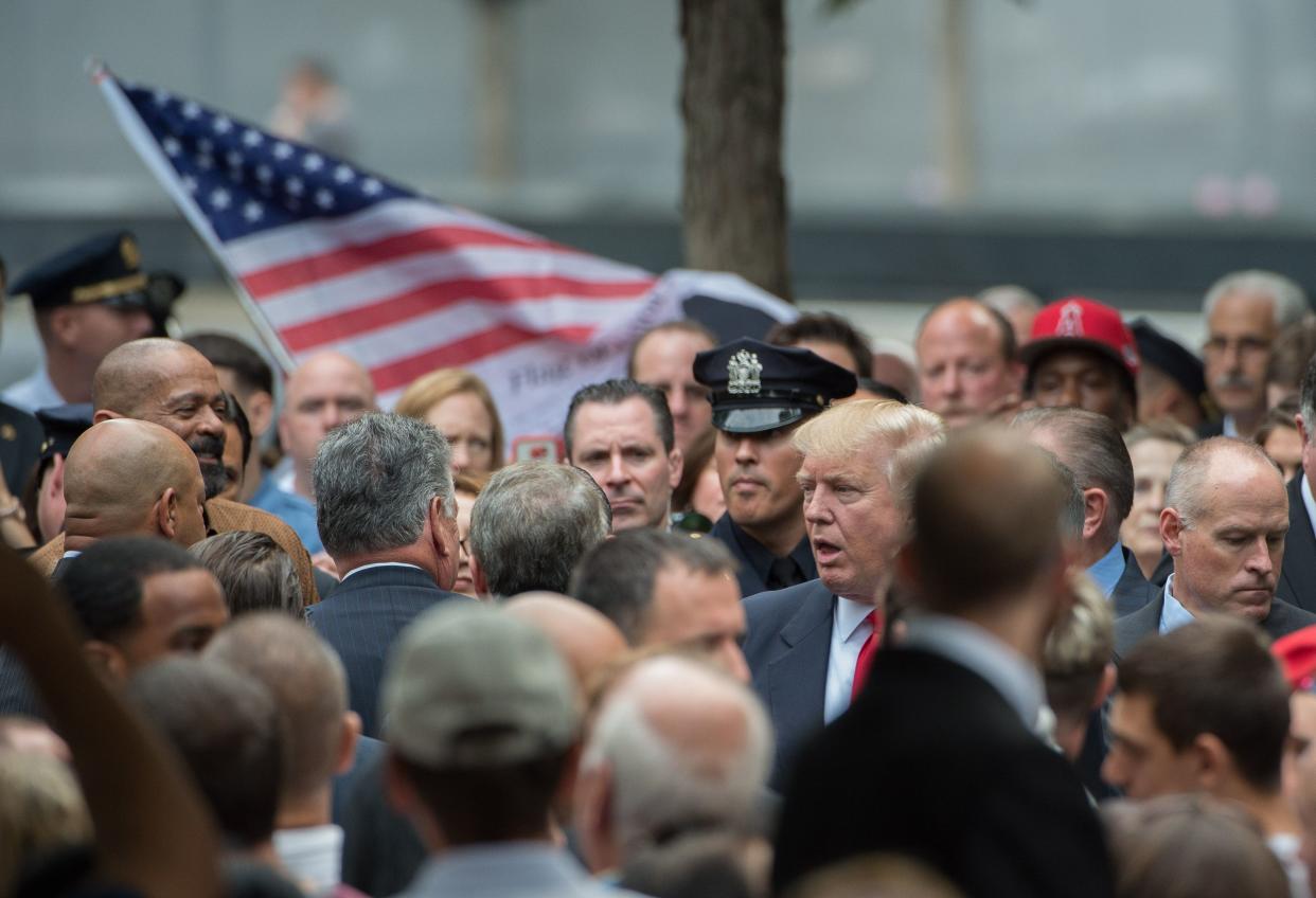 Then-Republican presidential candidate Donald Trump arrives for the 15th Anniversary of September 11 ceremony at the 9/11 Memorial and Museum, Sunday, September 11, 2016 in New York. 