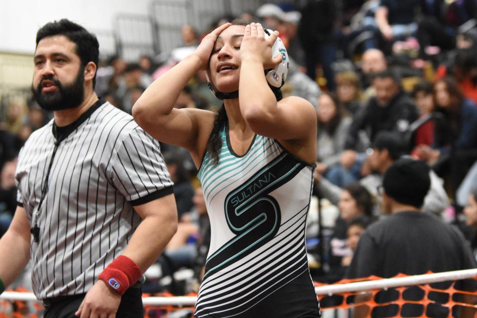 Sultana's Nataly Diaz reacts after beating Redlands East Valley's Savannah Gutierrez for the 110-pound title at the CIF-Southern Section Central Division Individual Championships, hosted by Adelanto High School, on Saturday, Feb. 10, 2024.