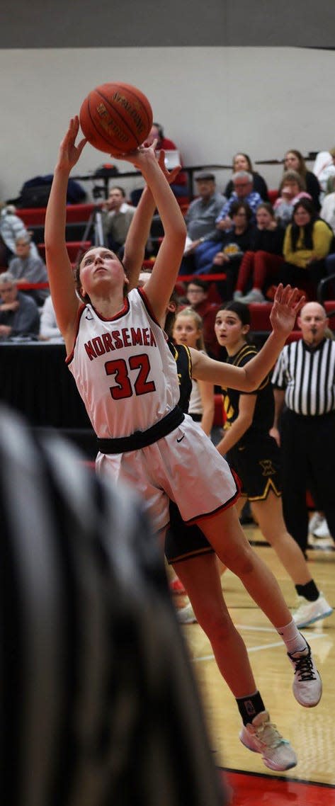 Kate Berggen goes up for a shot during Roland-Story's 52-41 loss to Class 3A No. 5 West Marshall Friday in Story City.