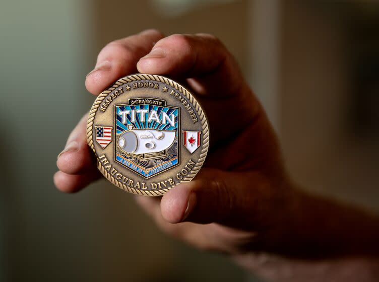 El Segundo, CA - June 22: Bill Price, shown holding a Titan inagural dive coin, a California man who went on dives in the Titan, the now-missing submersible that was exploring the Titanic wreckage. Photo taken in El Segundo Thursday, June 22, 2023. (Allen J. Schaben / Los Angeles Times)