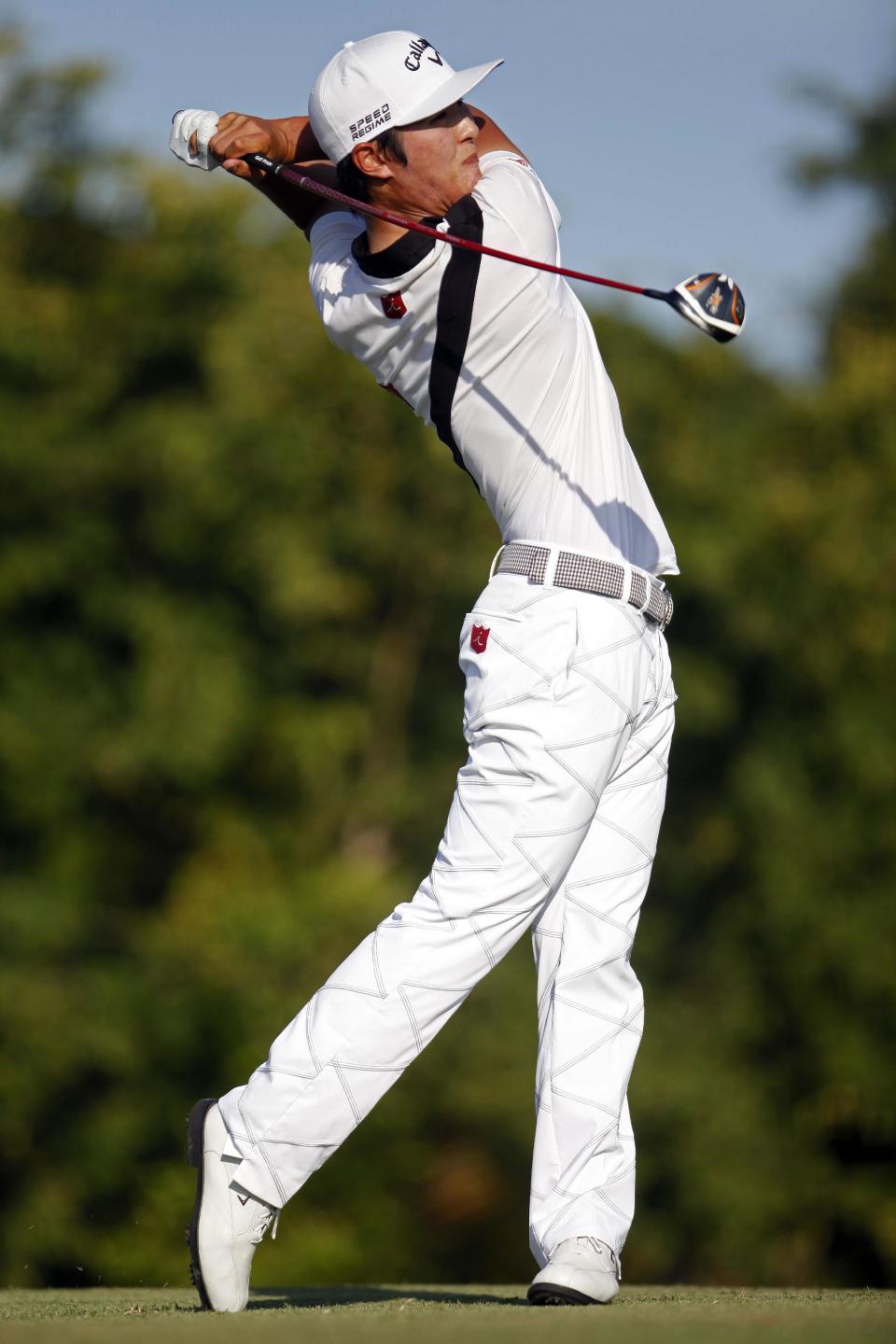 New Zealand's Danny Lee tees off from the 18th hole during the final round of the Puerto Rico Open PGA golf tournament in Rio Grande, Puerto Rico, Sunday, March 9, 2014. (AP Photo/Ricardo Arduengo)