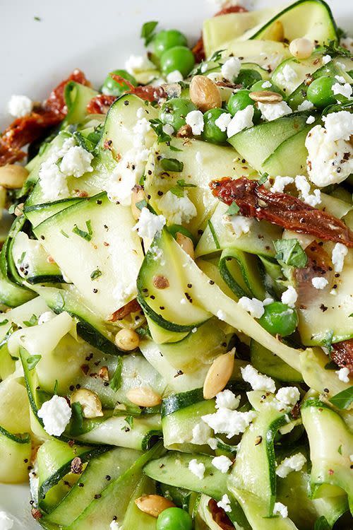 <p>This <a href="https://www.delish.com/uk/cooking/recipes/g28961915/courgette-recipes/" rel="nofollow noopener" target="_blank" data-ylk="slk:courgette;elm:context_link;itc:0;sec:content-canvas" class="link ">courgette</a> salad is so easy to throw together, and best of all, there's no cooking required! Yep, those courgette ribbons are served raw, tossed with sundried toms and goat's cheese, and a <a href="https://www.delish.com/uk/cooking/recipes/a29771350/pumpkin-spice-poke-cake-recipe/" rel="nofollow noopener" target="_blank" data-ylk="slk:pumpkin;elm:context_link;itc:0;sec:content-canvas" class="link ">pumpkin</a> seed dressing which although optional is a MUST in our opinion.</p><p>Get the <a href="https://www.delish.com/uk/cooking/recipes/a29840065/courgette-salad/" rel="nofollow noopener" target="_blank" data-ylk="slk:Courgette Salad;elm:context_link;itc:0;sec:content-canvas" class="link ">Courgette Salad</a> recipe.</p>