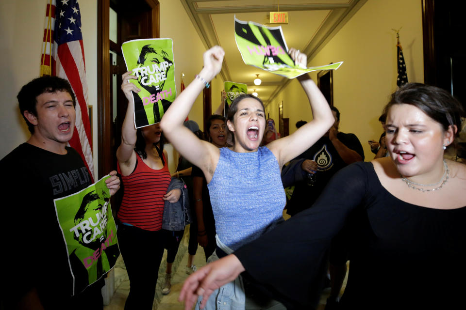 Health care activists protest to stop the Republican health care bill at Russell Senate Office Building on Capitol Hill on July 10, 2017.