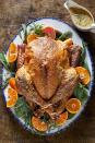 <p>Of course, it all starts with the perfect turkey—and you've definitely found it here. We swap out butter for olive oil, and keep the salt low, but, garnished with clementines and rosemary, this crispy bird is still flavorful. And it's practically an edible <a href="https://www.countryliving.com/entertaining/g2130/thanksgiving-centerpieces/" rel="nofollow noopener" target="_blank" data-ylk="slk:table centerpiece;elm:context_link;itc:0;sec:content-canvas" class="link ">table centerpiece</a>.</p><p><strong><a href="https://www.countryliving.com/food-drinks/a29130091/seasoned-roasted-turkey-recipe/" rel="nofollow noopener" target="_blank" data-ylk="slk:Get the recipe;elm:context_link;itc:0;sec:content-canvas" class="link ">Get the recipe</a>.</strong></p><p><strong><a class="link " href="https://www.amazon.com/dp/B000FDN1RG/?tag=syn-yahoo-20&ascsubtag=%5Bartid%7C10050.g.33370793%5Bsrc%7Cyahoo-us" rel="nofollow noopener" target="_blank" data-ylk="slk:SHOP PLATTERS;elm:context_link;itc:0;sec:content-canvas">SHOP PLATTERS</a><br></strong></p>