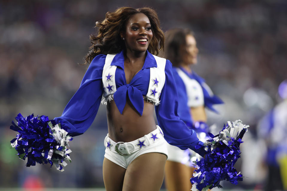 Oct 29, 2023; Arlington, Texas, USA; Dallas Cowboys cheerleader performs in the first half against the Los Angeles Rams at AT&T Stadium. Mandatory Credit: Tim Heitman-USA TODAY Sports