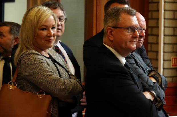 Michelle O'Neill and DUP leader Jeffrey Donaldson at the funeral of David Trimble
