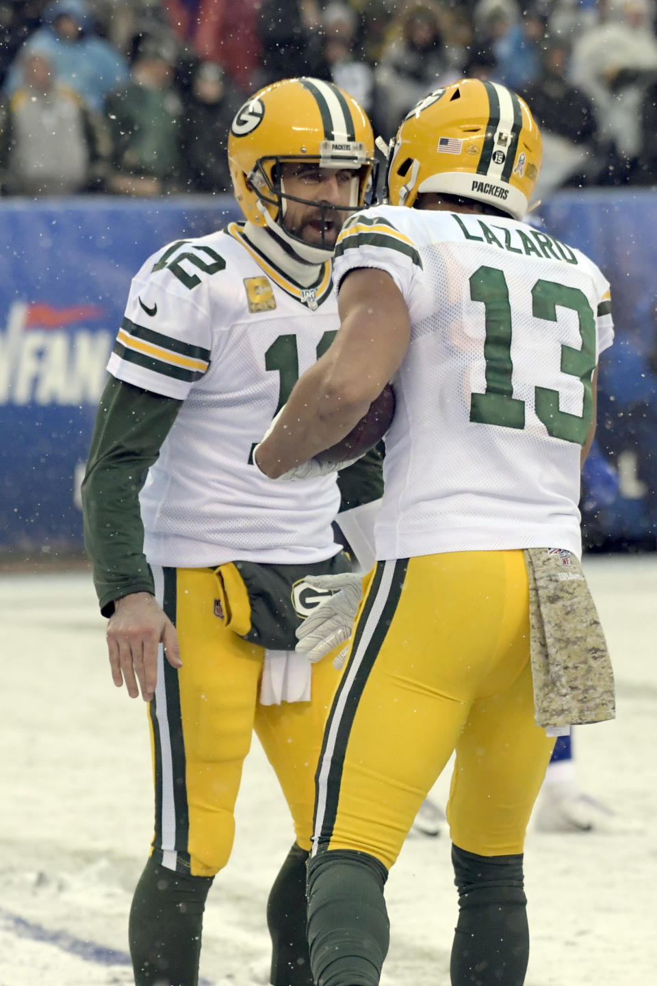 Green Bay Packers quarterback Aaron Rodgers, left, celebrates with Allen Lazard after a touchdown during the first half of an NFL football game against the New York Giants, Sunday, Dec. 1, 2019, in East Rutherford, N.J. (AP Photo/Bill Kostroun)